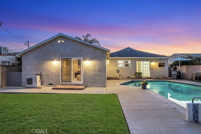 10404 Gaviota Ave, Granada Hills, CA 91344 - back of property featuring stucco siding and a patio area