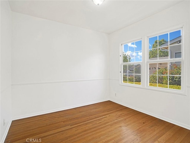10404 Gaviota Ave, Granada Hills, CA 91344 - empty room featuring hardwood / wood-style floors and baseboards