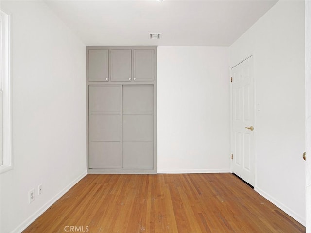 10404 Gaviota Ave, Granada Hills, CA 91344 - unfurnished bedroom featuring light wood finished floors