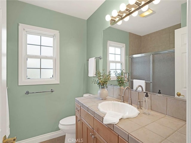 10404 Gaviota Ave, Granada Hills, CA 91344 - bathroom with vanity, a shower stall, and tile patterned flooring