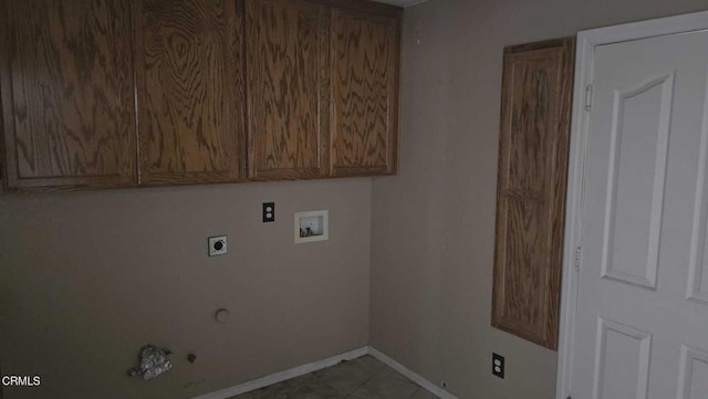 12780 Fir St, Oak Hills, CA 92344 - washroom featuring electric dryer hookup, hookup for a washing machine, gas dryer hookup, baseboards, and cabinet space