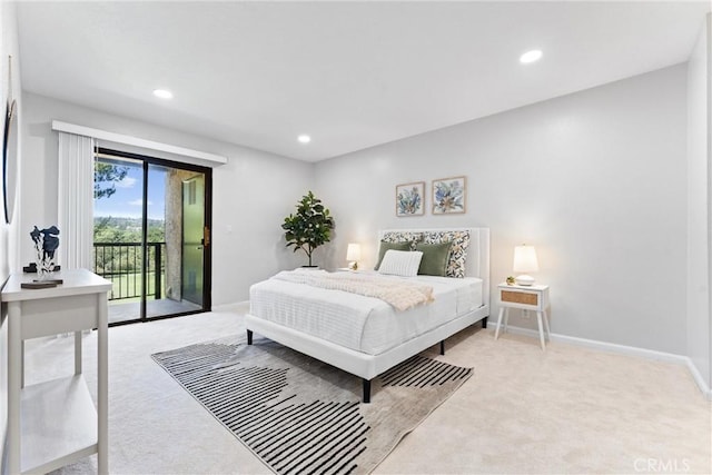 25541 Indian Hill Ln Unit P, Laguna Hills, CA 92653 - bedroom featuring light colored carpet, access to outside, and recessed lighting