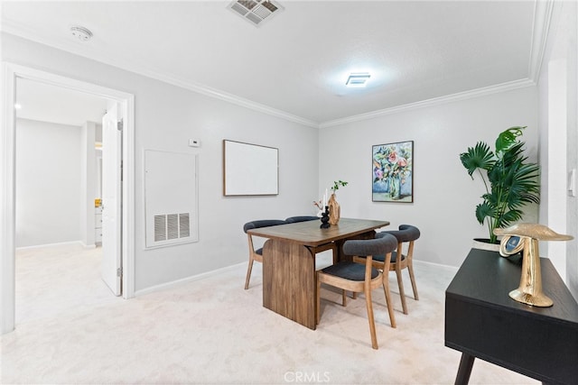 25541 Indian Hill Ln Unit P, Laguna Hills, CA 92653 - dining area featuring ornamental molding and light colored carpet