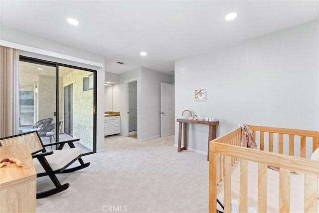 25541 Indian Hill Ln Unit P, Laguna Hills, CA 92653 - bedroom with light colored carpet, recessed lighting, and access to exterior