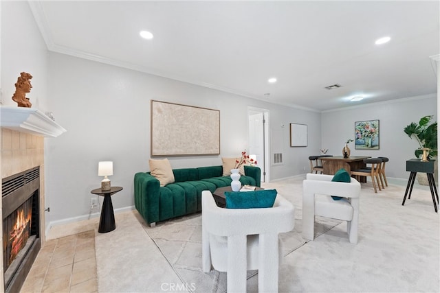 25541 Indian Hill Ln Unit P, Laguna Hills, CA 92653 - living area with a tile fireplace, crown molding, and recessed lighting