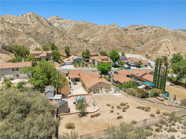 15242 Poppy Meadow St, Canyon Country, CA 91387 - aerial perspective of suburban area with mountains