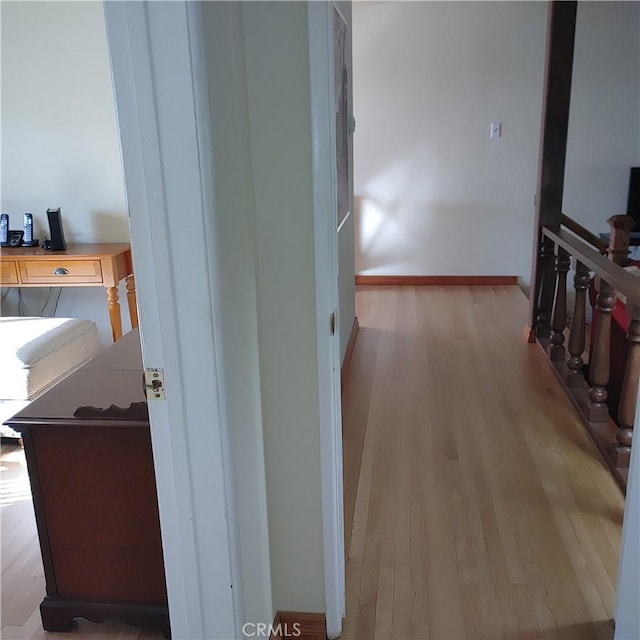 14504 Neargrove Rd, La Mirada, CA 90638 - corridor featuring wood finished floors and baseboards