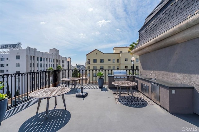 585 N Rossmore Ave Unit 209, Los Angeles, CA 90004 - view of patio / terrace featuring a sink and a balcony