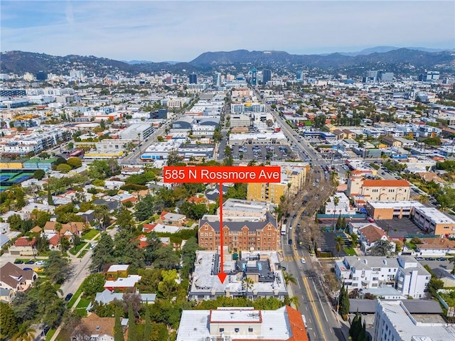 585 N Rossmore Ave Unit 209, Los Angeles, CA 90004 - aerial overview of property's location featuring a mountain backdrop and nearby urban area