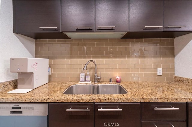 585 N Rossmore Ave Unit 209, Los Angeles, CA 90004 - kitchen with a sink, dark brown cabinets, dishwashing machine, backsplash, and a textured wall