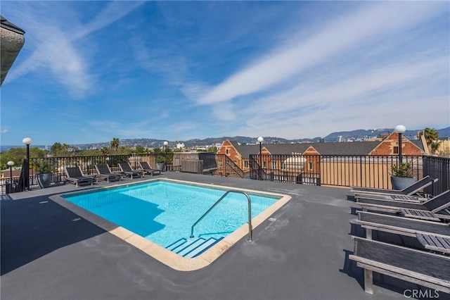585 N Rossmore Ave Unit 209, Los Angeles, CA 90004 - community pool with a patio and a mountain view