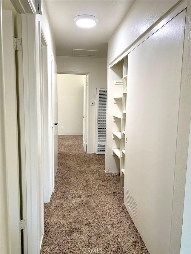 1017 W Prune Ave, Lompoc, CA 93436 - corridor with a heating unit, carpet, and attic access