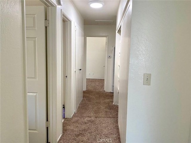 1017 W Prune Ave, Lompoc, CA 93436 - hall with carpet, a heating unit, and attic access