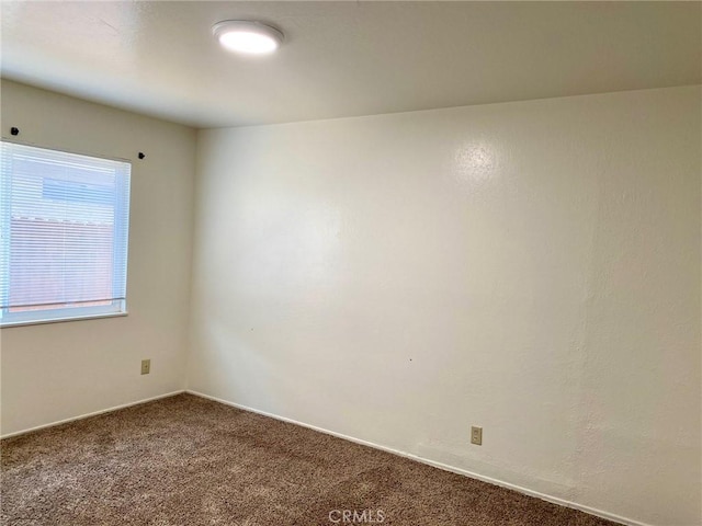1017 W Prune Ave, Lompoc, CA 93436 - carpeted spare room featuring baseboards