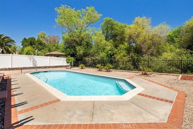36364 Provence Dr, Murrieta, CA 92562 - view of swimming pool with a patio area and a fenced backyard