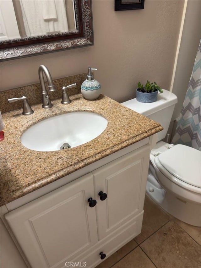 12531 Cluster Pines Rd, Garden Grove, CA 92845 - bathroom featuring toilet, vanity, tile patterned floors, and a shower with shower curtain