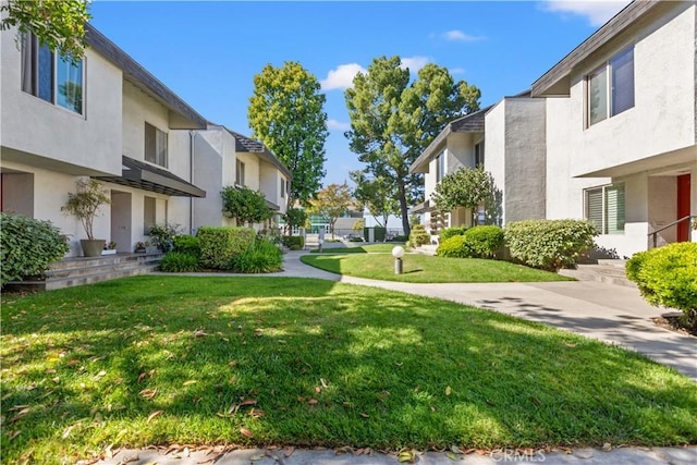 12531 Cluster Pines Rd, Garden Grove, CA 92845 - surrounding community featuring a residential view and a lawn