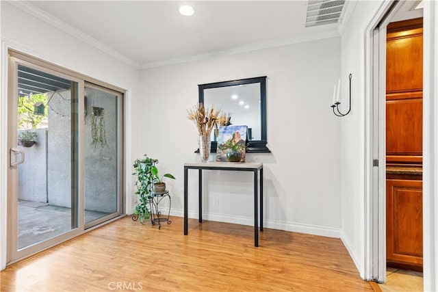 12531 Cluster Pines Rd, Garden Grove, CA 92845 - hallway with light wood finished floors, crown molding, baseboards, and recessed lighting