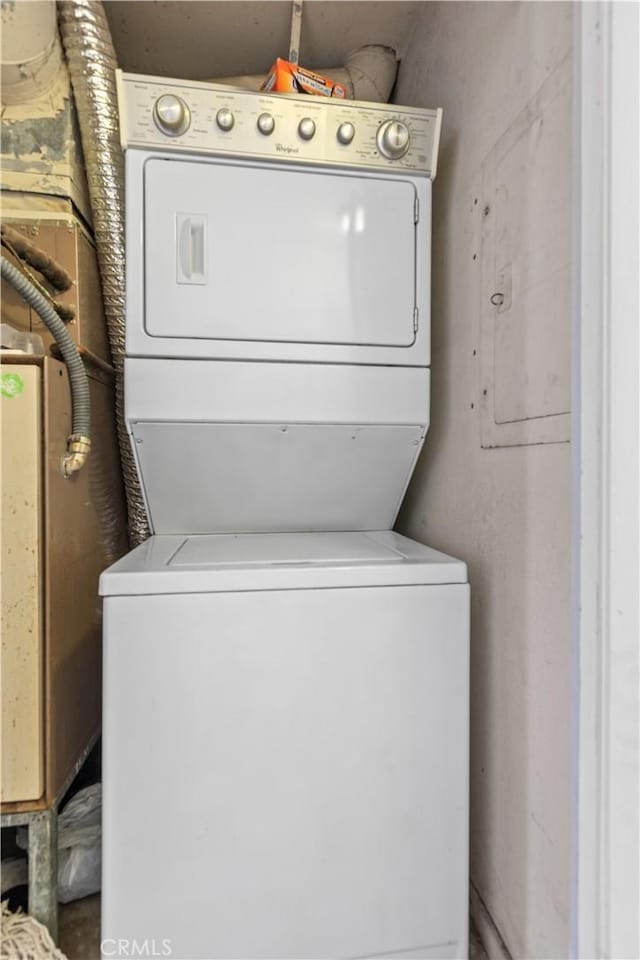 12531 Cluster Pines Rd, Garden Grove, CA 92845 - washroom with stacked washing machine and dryer