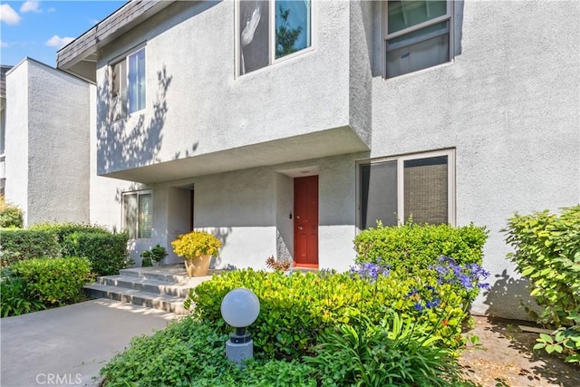 12531 Cluster Pines Rd, Garden Grove, CA 92845 - view of exterior entry featuring stucco siding