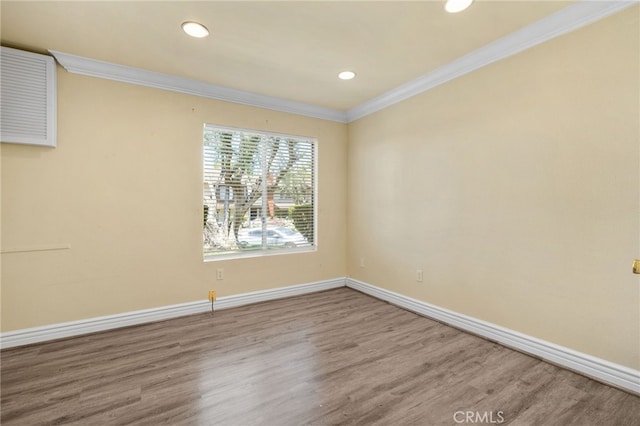 1725 Aspen Village Way, West Covina, CA 91791 - empty room featuring crown molding, wood finished floors, baseboards, and recessed lighting