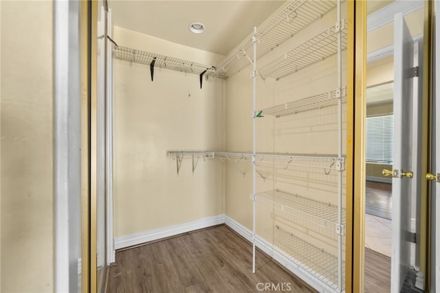 1725 Aspen Village Way, West Covina, CA 91791 - spacious closet featuring wood finished floors