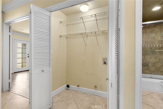 1725 Aspen Village Way, West Covina, CA 91791 - laundry room with washer hookup, light tile patterned flooring, baseboards, and recessed lighting