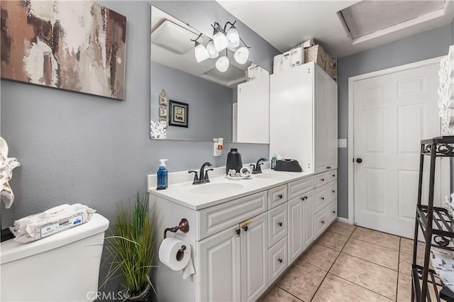 13250 Mercer St, Pacoima, CA 91331 - full bath with toilet, double vanity, and tile patterned flooring