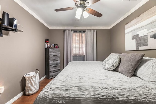 13250 Mercer St, Pacoima, CA 91331 - bedroom featuring baseboards, dark wood-type flooring, ceiling fan, and crown molding