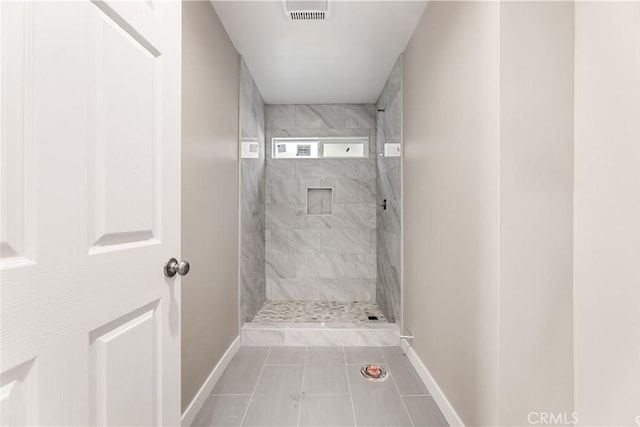13250 Mercer St, Pacoima, CA 91331 - bathroom featuring baseboards, a shower stall, and tile patterned flooring