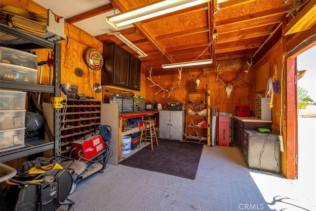 5498 Forked Horn Pl, Paso Robles, CA 93446 - garage featuring a workshop area and wood walls