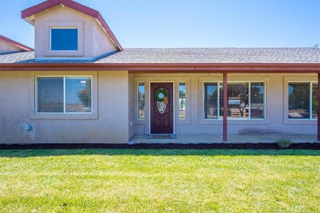 5498 Forked Horn Pl, Paso Robles, CA 93446 - view of front of home with roof with shingles, a front yard, and stucco siding