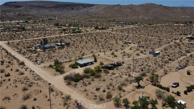 1240 Geronimo Trl, Yucca Valley, CA 92284 - aerial view of property's location featuring a desert landscape, a mountain backdrop, and rural landscape