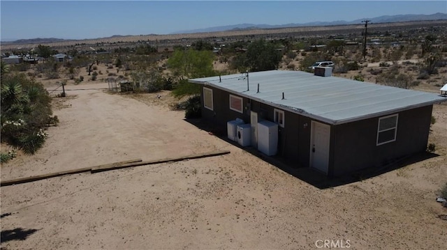 1240 Geronimo Trl, Yucca Valley, CA 92284 - view of rural area with a desert landscape and a mountainous background