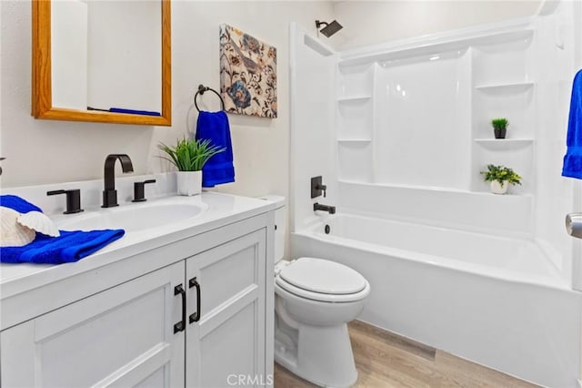 309 N Raitt St Unit C, Santa Ana, CA 92703 - full bath featuring toilet, vanity, wood finished floors, and shower / bath combination