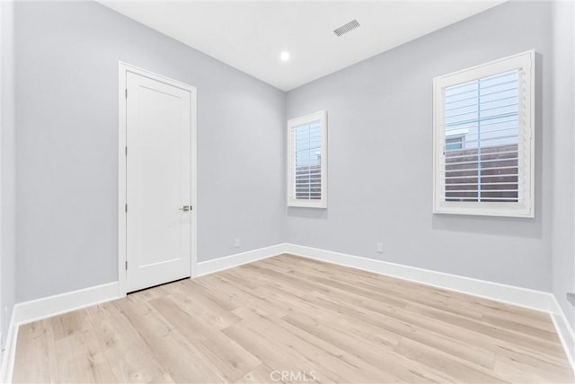 211 Fiore, Irvine, CA 92602 - spare room with baseboards, light wood-type flooring, healthy amount of natural light, and recessed lighting