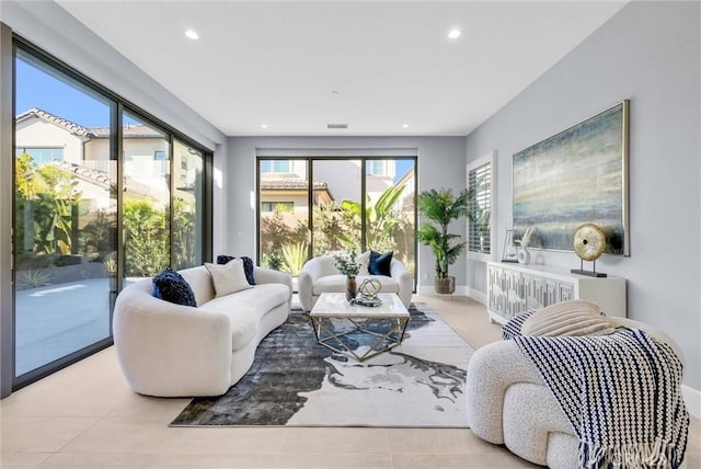 211 Fiore, Irvine, CA 92602 - tiled living area with recessed lighting and baseboards