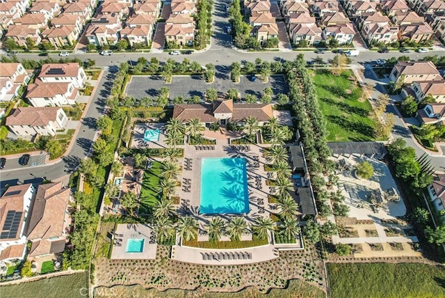 211 Fiore, Irvine, CA 92602 - aerial view of property and surrounding area with nearby suburban area and a pool area