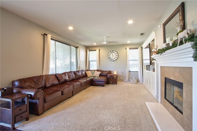 39883 S Creek Cir, Murrieta, CA 92563 - carpeted living area featuring a tiled fireplace, recessed lighting, and a ceiling fan