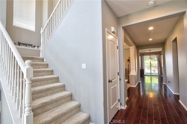39883 S Creek Cir, Murrieta, CA 92563 - stairway with wood finished floors, baseboards, and recessed lighting