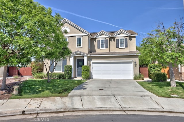 39883 S Creek Cir, Murrieta, CA 92563 - traditional home with stucco siding, driveway, a tiled roof, an attached garage, and solar panels
