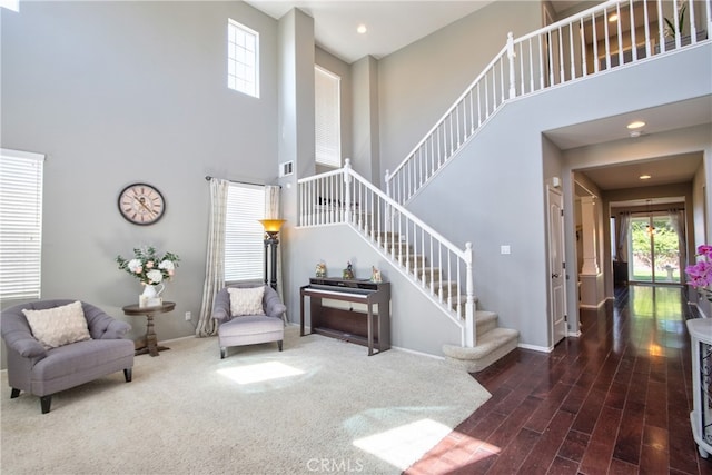 39883 S Creek Cir, Murrieta, CA 92563 - entryway with a high ceiling, stairs, baseboards, and wood finished floors