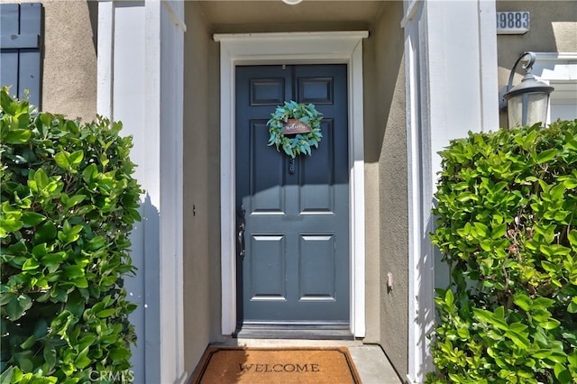 39883 S Creek Cir, Murrieta, CA 92563 - entrance to property featuring stucco siding