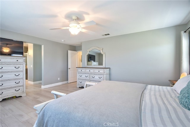 39883 S Creek Cir, Murrieta, CA 92563 - bedroom with light wood-type flooring, baseboards, and a ceiling fan