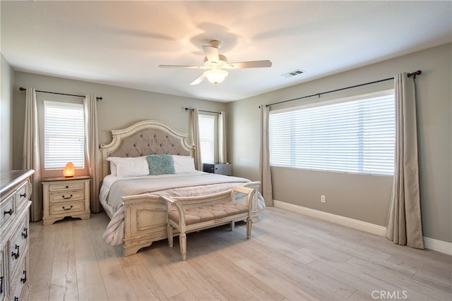 39883 S Creek Cir, Murrieta, CA 92563 - bedroom featuring light wood-type flooring, baseboards, and a ceiling fan