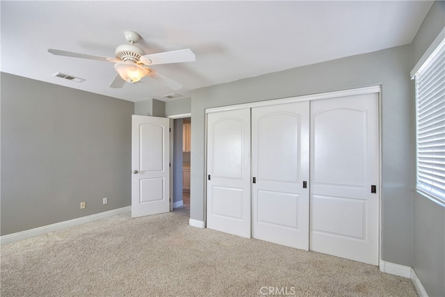 39883 S Creek Cir, Murrieta, CA 92563 - unfurnished bedroom featuring light carpet, a closet, baseboards, and a ceiling fan