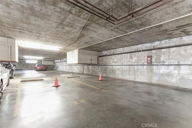 465 Ivy St Unit 203, Glendale, CA 91204 - parking garage featuring concrete block wall