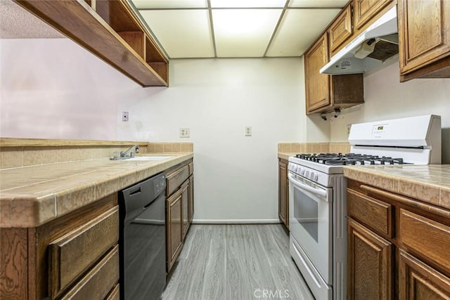 465 Ivy St Unit 203, Glendale, CA 91204 - kitchen featuring white range with gas stovetop, dishwasher, under cabinet range hood, open shelves, and light wood-style flooring