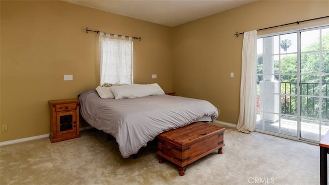 1515 Indiana Ave, South Pasadena, CA 91030 - bedroom with access to exterior, multiple windows, and light colored carpet