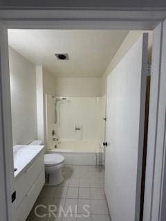 22425 Caminito Grande Unit 70, Laguna Hills, CA 92653 - bathroom featuring toilet, vanity, tub / shower combination, and tile patterned floors
